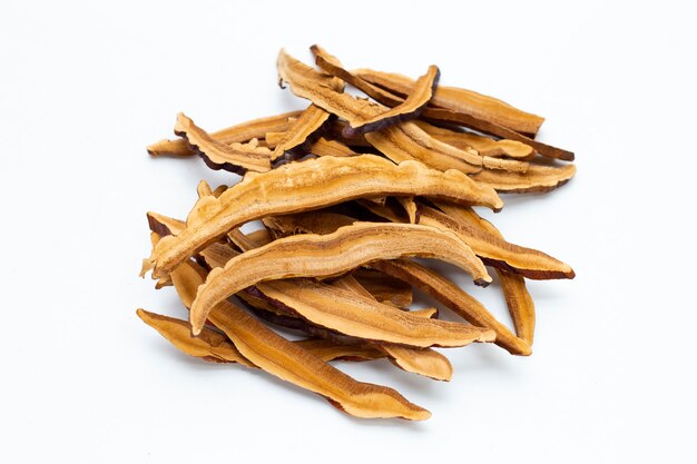 Dried lingzhi mushroom slices on white background