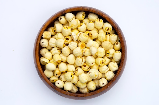 Dried lotus seeds on white background