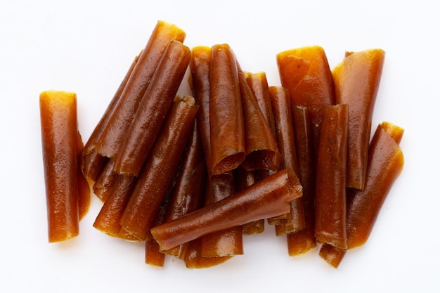 dried mango paste sheets on white background
