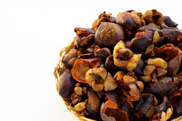 Dried mangosteen peel on white background