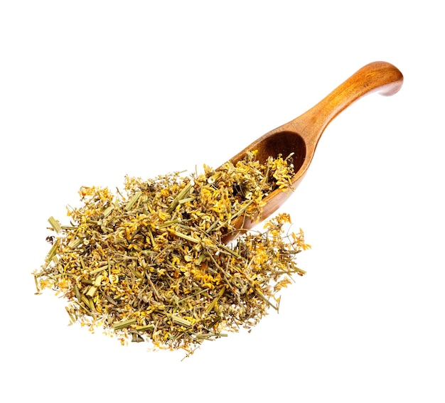 Dried Melilotus officinalis Yellow Sweet Clower on the wooden spoon isolated