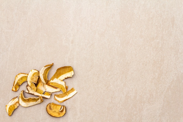 Dried mushrooms on concrete surface