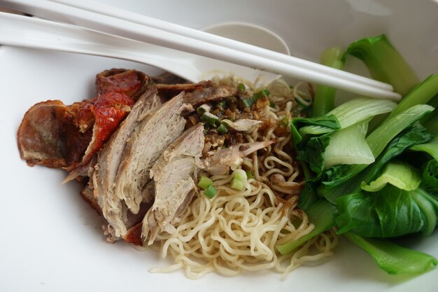 Dried noodles in a white bowl