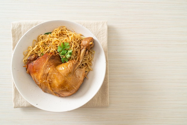 Dried noodles with braised chicken bowl - asian food style