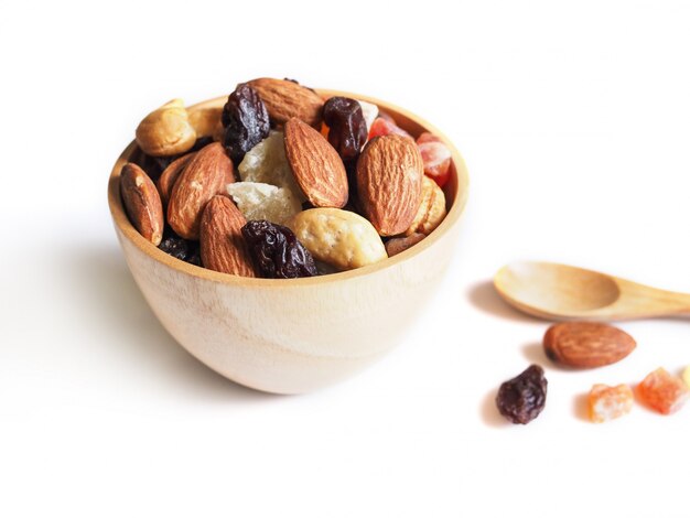 Dried nuts tropical fruits isolated on white background