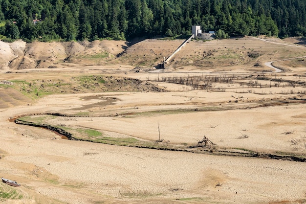 Photo dried out lokvarsko lake croatia during maintance of the dam