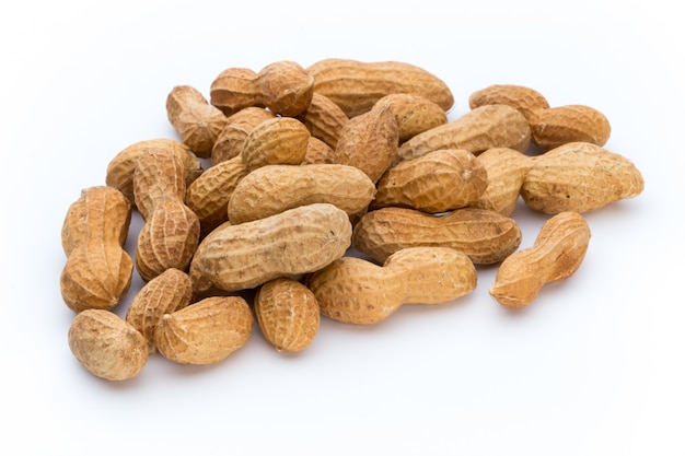 Dried peanuts on the white background