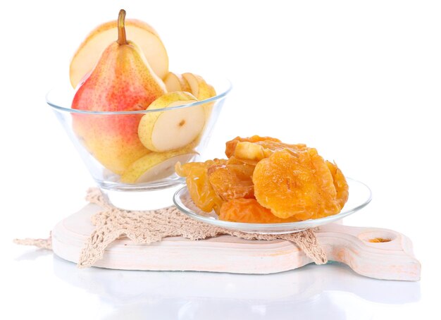 Dried pears in glass bowl isolated on white