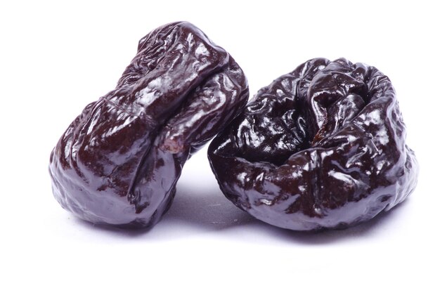 Photo dried plum on a white background