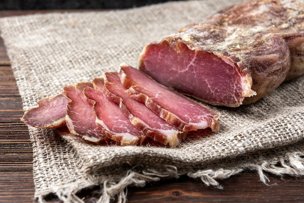 Dried pork meat on table