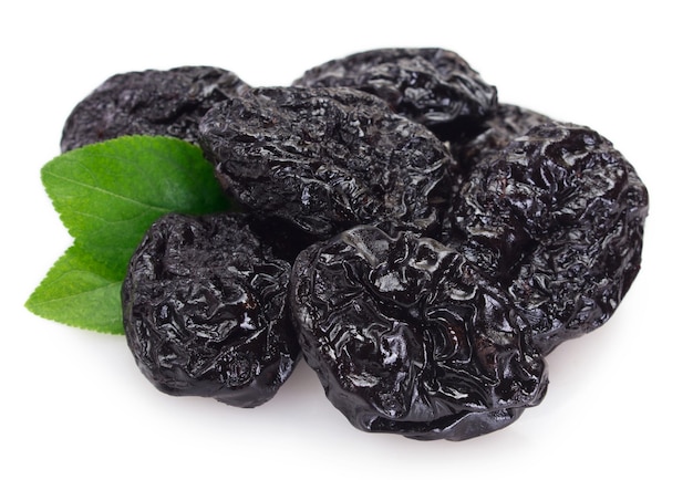 Dried prunes isolated on white background closeup