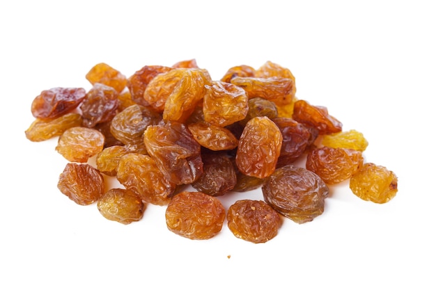 Dried raisins on a white background