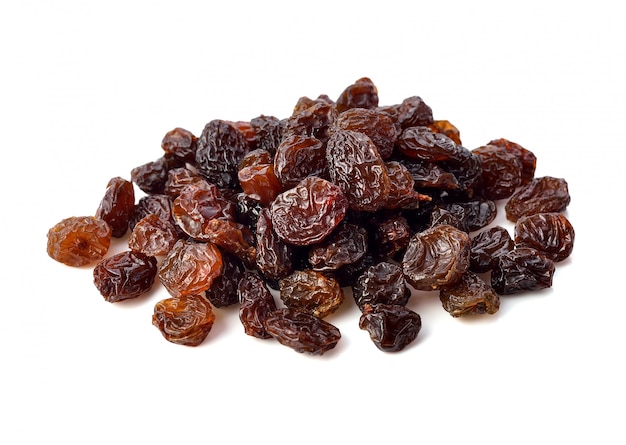 Dried raisins on white.