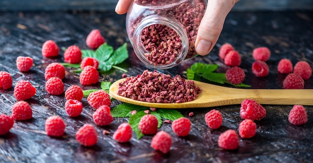 Dried raspberries on a wooden table