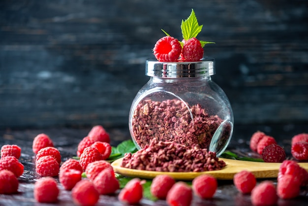 Dried raspberries on a wooden table