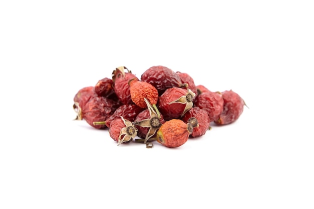 Dried rose hip berries isolated on white background