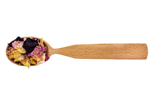 Dried rose petals in a wooden spoon isolated on a white background