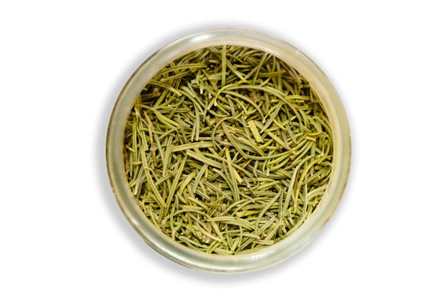 Dried rosemary in a glass jar top view Isolated photo with shadow