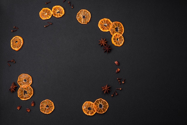 Photo dried round shape slices of bright orange color tangerine