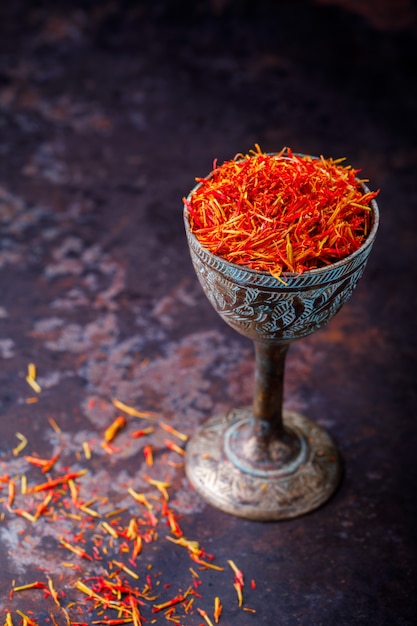Dried saffron spice a glass of metal Oriental flavor