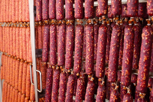 Dried sausage hanging on rope