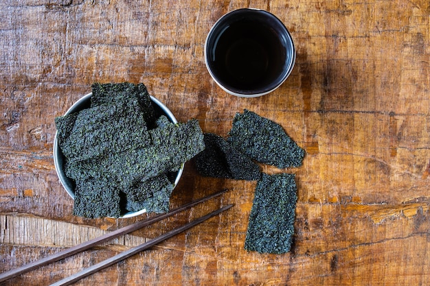 Dried seaweed On the wood background