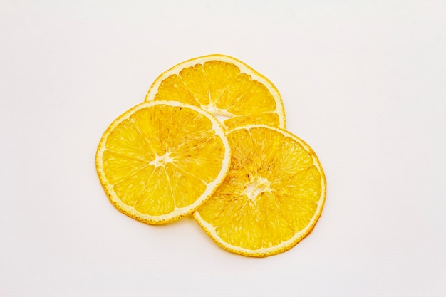 Dried slices of orange isolated on white background