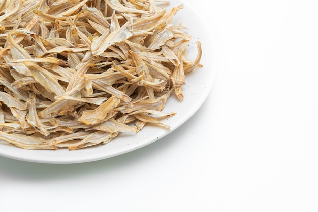 dried small crispy bake fish isolated on white background