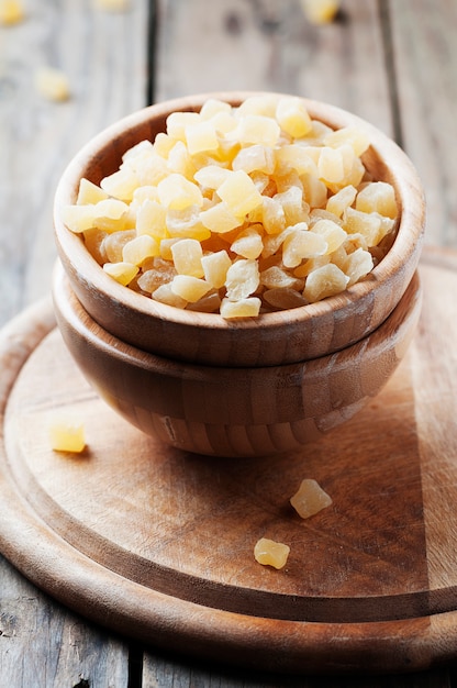 Dried spicy ginger on the wooden table