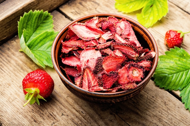 Dried summer berry,fruit dessert.Strawberry chips,berry sweetness in bowl