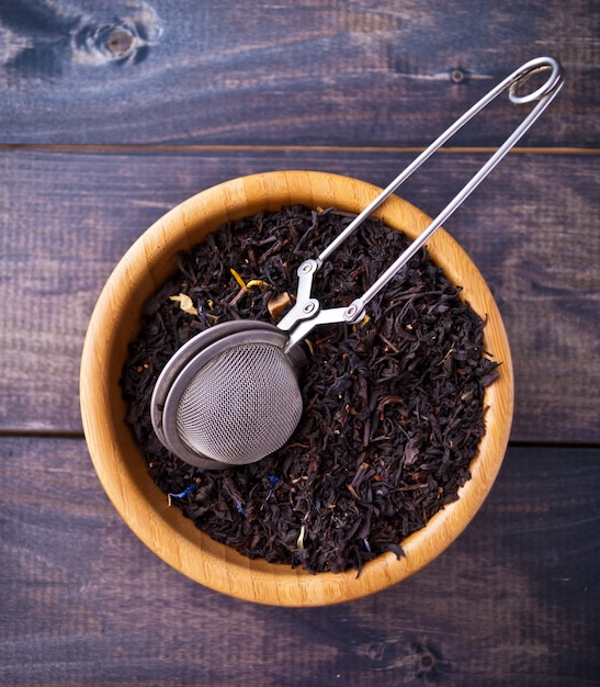 Dried tea leaves in bowl