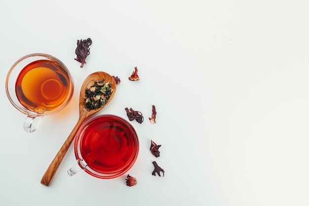 Dried tea teaspoon on white background