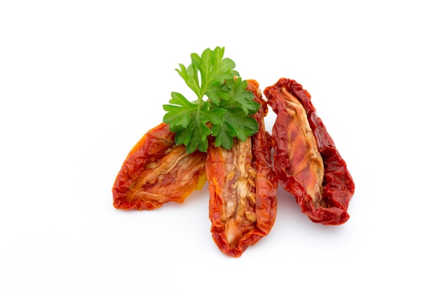 Dried tomatoes isolated on white background.