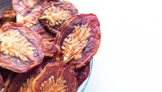 Photo dried tomatoes on a white background with space for text food