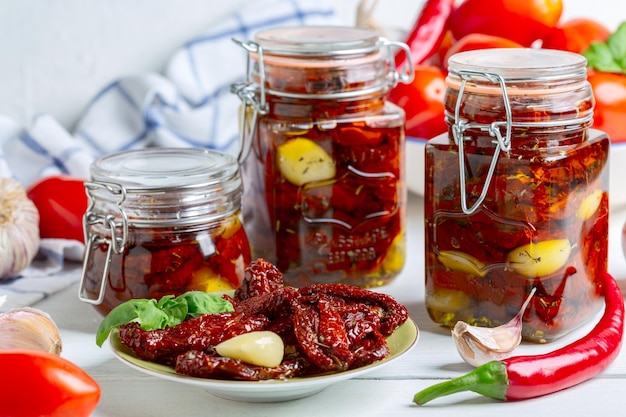Dried tomatoes with herbs and olive oil