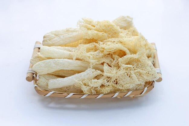 Dried tropical stinkhorn mushroom in bamboo basket