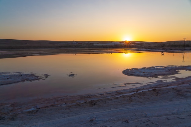 Dried up salt lake at sunrise