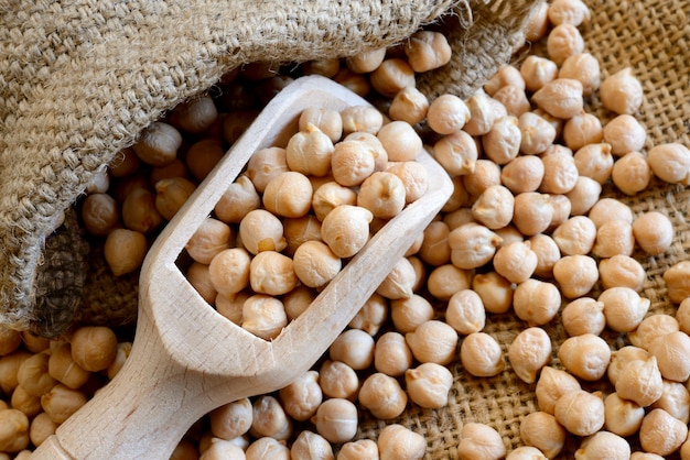 Dried white chickpeas on jute sack