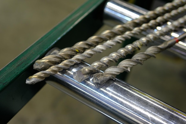 Photo drill bits in factory manufacturing workshop