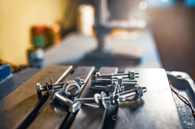 Drilling machine at the workplace of a toolman locksmith