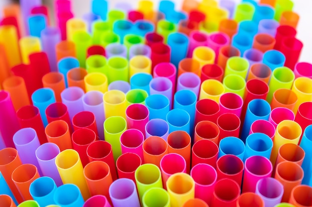 Drinking straws colorful coming together.