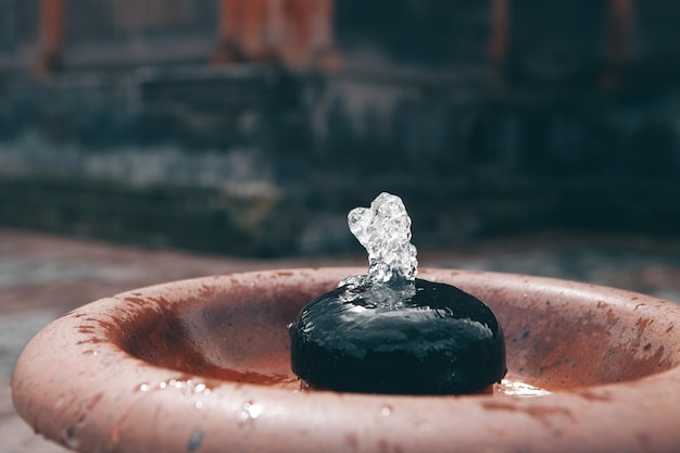 Drinking water fountain in park on a sunny day