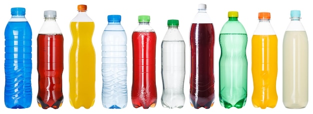 Drinks lemonade cola drink many softdrinks bottles in a row isolated on white