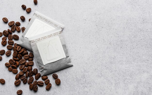 Drip coffee paper bags with coffee beans