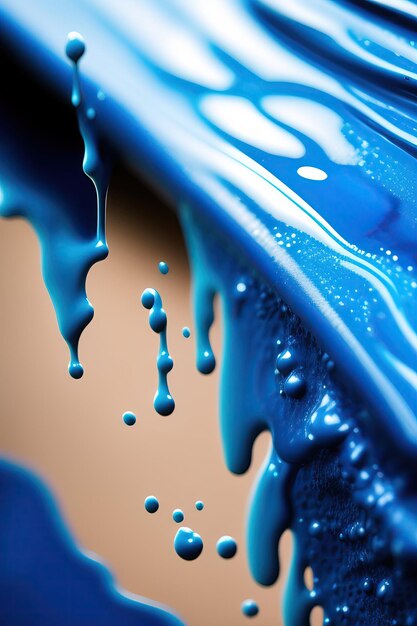 Dripping blue paint closeup