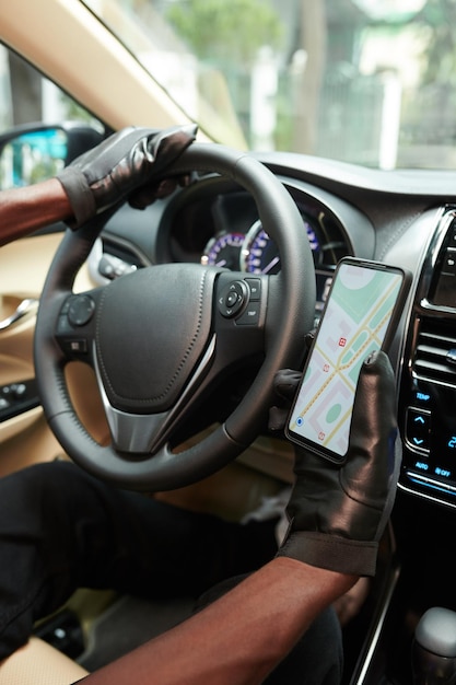 Driver Checking Map on Smartphone