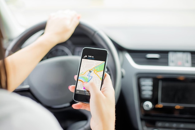 Driver using navigation app on mobile phone