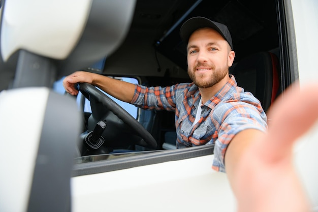 driver behind the wheel in truck cabin