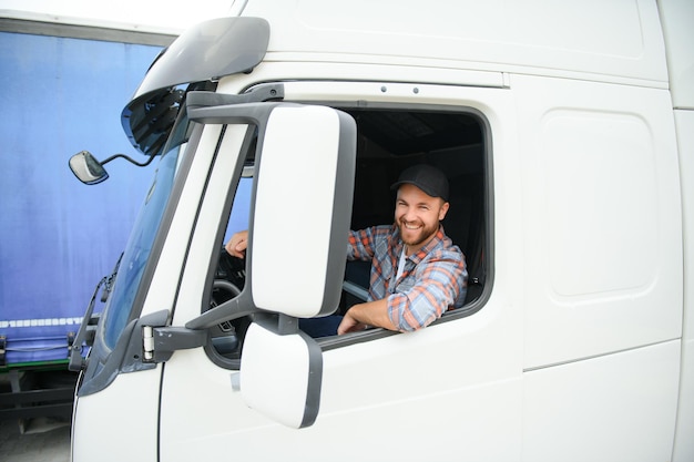 driver behind the wheel in truck cabin