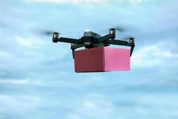 Drone che trasporta casella di posta per la consegna di aria veloce.
